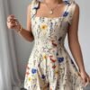 2240c9979350451184bc8bef8a39377f-goods.jpeg Printed Bow-Waist Holiday Jumpsuit